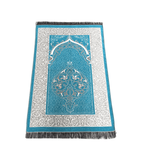 Ismani prayer mat with intricate blue and silver design, soft and elegant for daily prayers.
