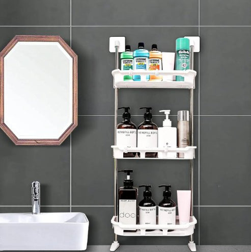 Hanging storage rack mounted on wall displaying bathroom essentials like shampoos, soaps, and towels.