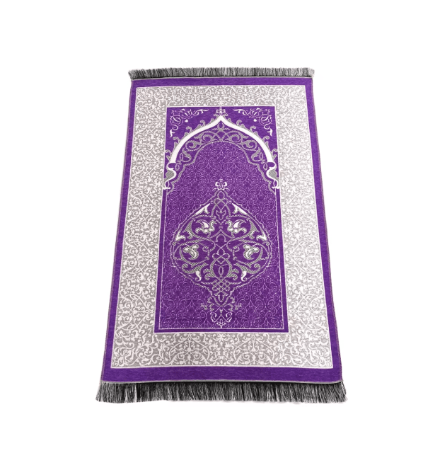 Ismani Prayer Mat showcasing an elegant purple design with intricate patterns and fringed edges for comfortable prayer.